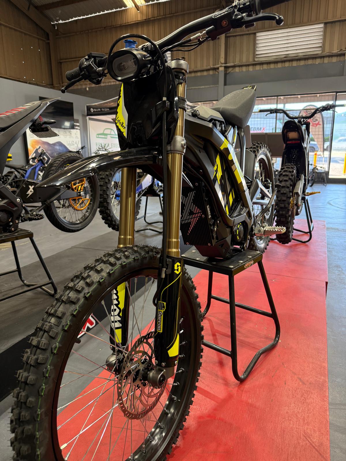 Custom SurRon LBX build with an X-9000 controller, one of our upgraded electric dirt bikes