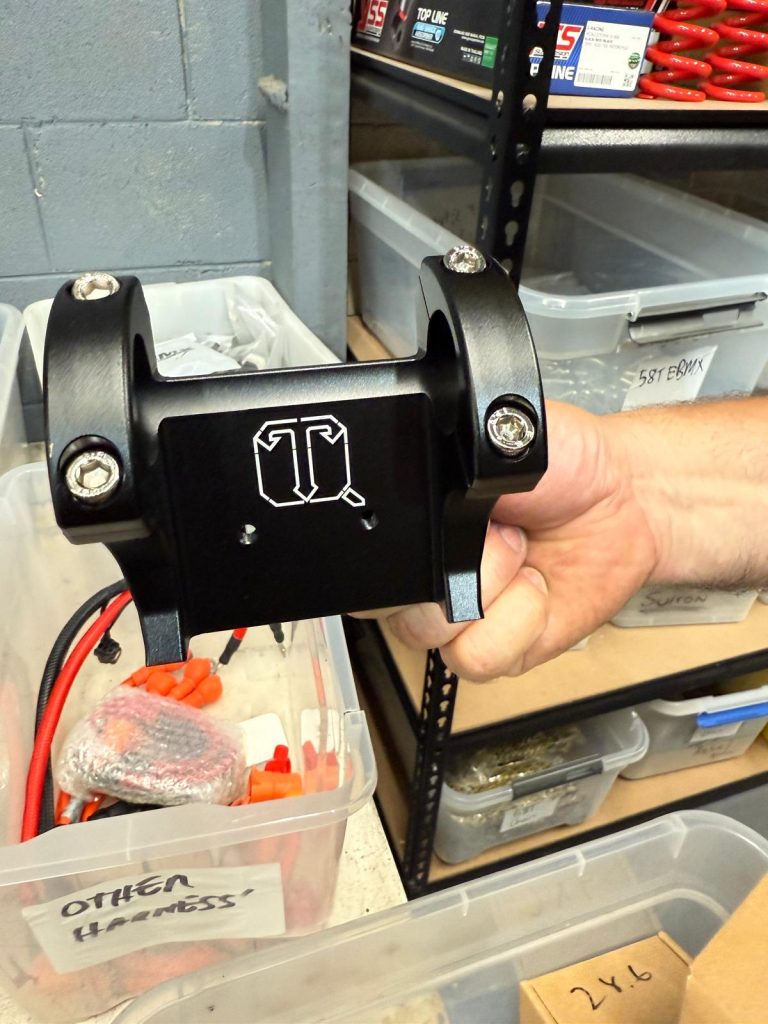 Direct mount riser stem fitted to a Surron LBX
